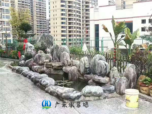 社区假山石鱼池施工